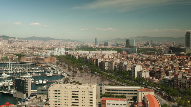 timelapse of the barcelona skyline shot from high vantage point