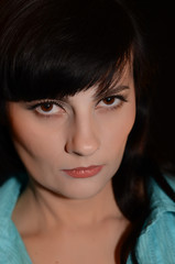Fototapeta premium The beautiful girl on a black background