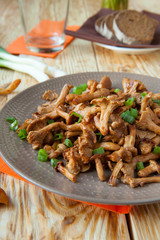 chanterelles stewed with slices of green onion