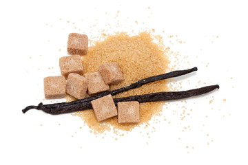 vanilla beans and brown vanilla sugar isolated on white backgrou