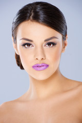 Fototapeta premium Beautiful girl with violet lips