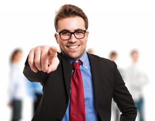Businessman pointing his finger at you