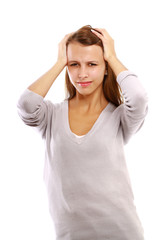 Young woman with head pain on white background