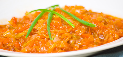 stewed cabbage on white plate
