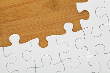 Puzzle on wooden board