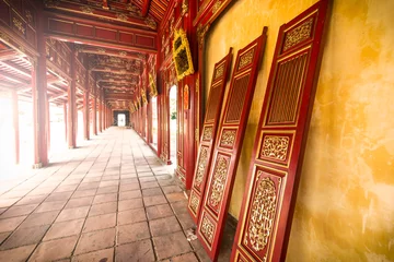 Fotobehang Red wooden hall of Hue citadel in Vietnam, Asia. © Konstantin Yolshin