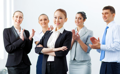 Asian business woman with colleagues
