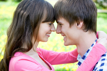 Closeup portrait of smiling young couple