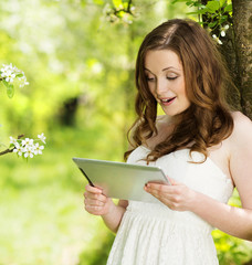 Fototapeta premium Girl with tablet