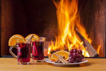 drinks at cozy fireplace