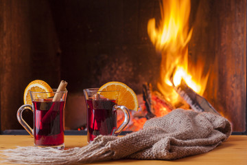 drinks at cozy fireplace