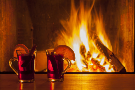 drinks at cozy fireplace