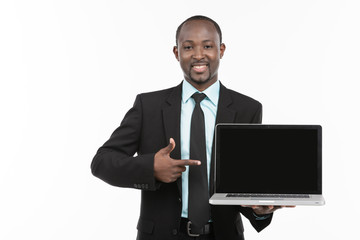 African businessman with laptop