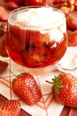 Strawberries in syrup and cream.