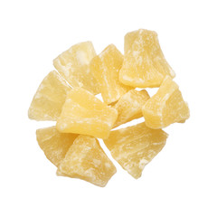 Dried pineapple pieces isolated on white background
