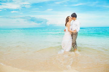 lovely couple near the ocean, bali