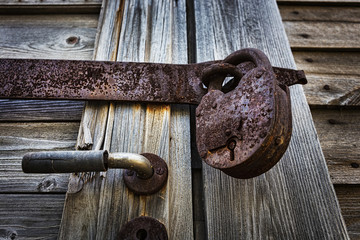 Old padlock on gatees