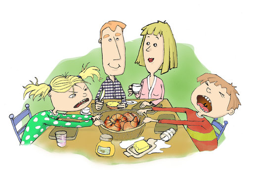 Familie beim Fr&uuml;hst&uuml;ck2