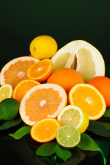 Lots ripe citrus isolated on black