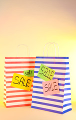 Fototapeta premium Striped bag on yellow background