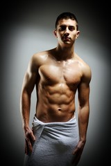 Fototapeta na wymiar Young sexy muscular man posing