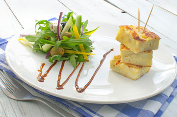 Spanish omelette with salad