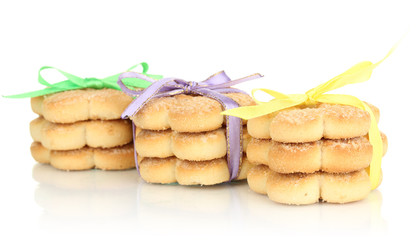 Sweet cookies tied with colorful ribbons isolated on white