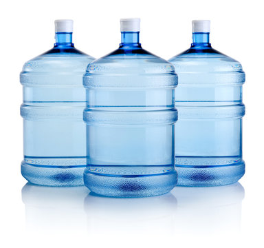 Three big bottles of water isolated on a white background