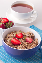 Breakfast with muesli and a cup of tea