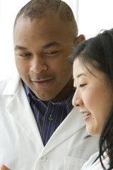 African American doctor with female Asian doctor