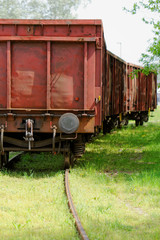 Fototapeta na wymiar Old wagon, in an unused railway track