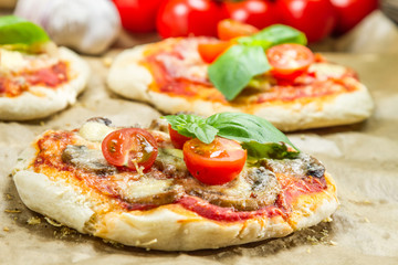 Close-up on freshly baked mini pizzas