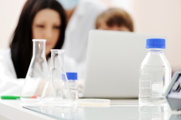 Young science workers research at medical lab