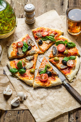 Pizza made of  mushrooms and served with cold drink