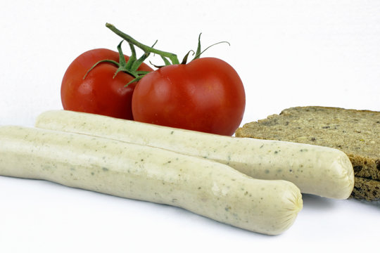 german sosage bratwurst tomatoes and bread