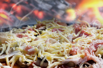 steaming hot fresh made pizza