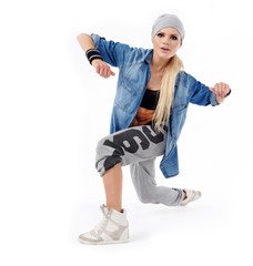 young and beautiful dancer posing in studio