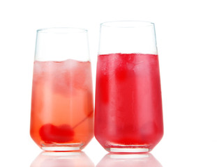 Two cherry cocktails with ice isolated on white