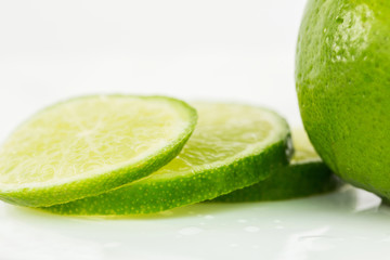Slices of lime fruit for background