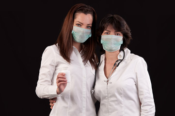 pharmacist female showing a drug bottle