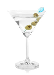 Martini glass with olives isolated on white.