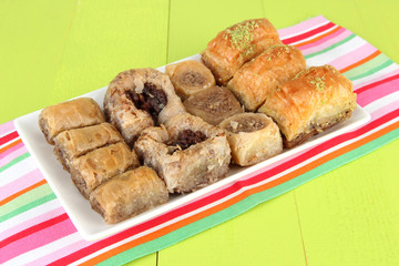 Sweet baklava on plate on table close-up