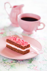 Piece of chocolate raspberry cake, selective focus