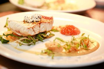 Gourmet fish dinner with roe
