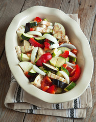 Fresh chopped vegetables in dish before baking.