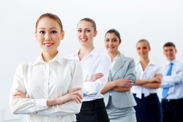 Group of business people standing in row