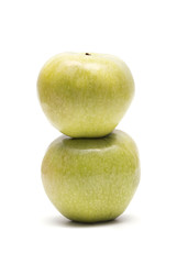 Two green apples isolated on white