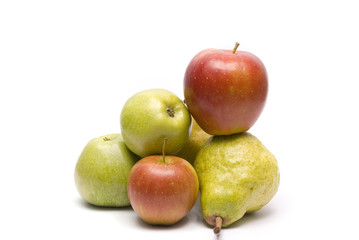 Heap of apples and pears isolated on white