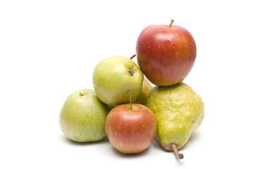 Heap of apples and pears isolated on white