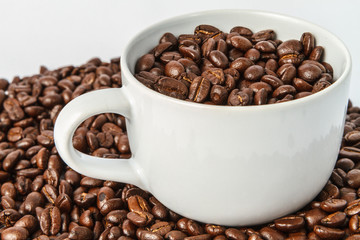 Coffee cup and coffee beans